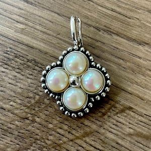 White beaded & silver pendant